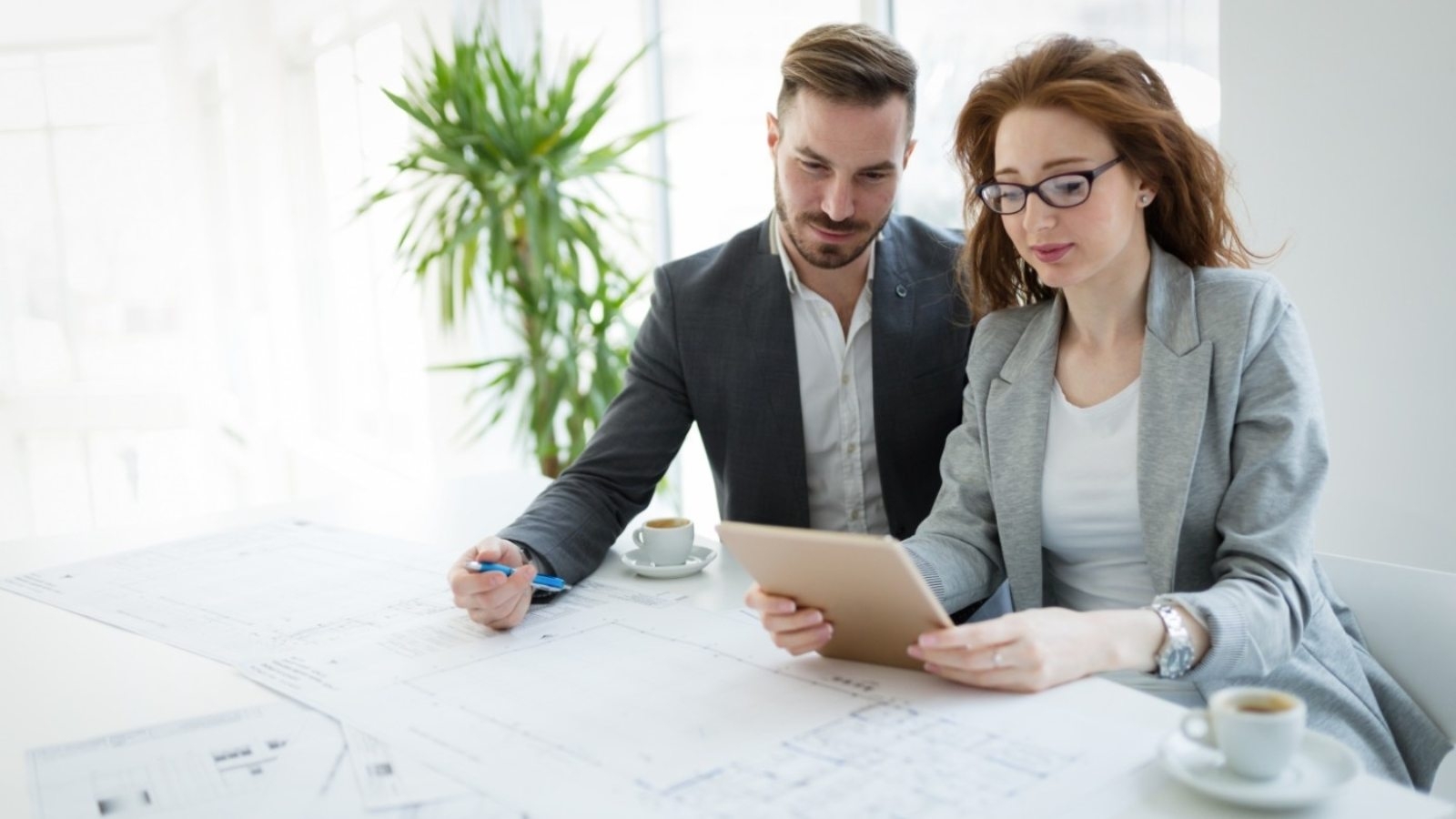 portrait-of-young-architect-woman-on-meeting-KFZCE3A